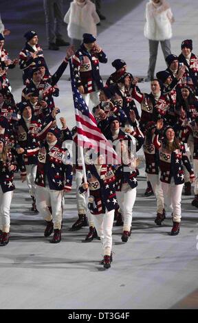 Sochi, Russia. 7th Feb, 2014. 2/8/2014 Sochi, Russia. | The 2014 Sochi Winter Olympics kicked off competition with the Opening Ceremony. Nordic combined skier Todd Lodwick carried the US flag for the Opening Ceremony on Friday in Sochi. Lodwick and the athletes of the USA enter Fisht Stadium during the Opening Ceremony. | Photo Sean M. Haffey UT San Diego. Credit:  U-T San Diego/ZUMAPRESS.com/Alamy Live News Stock Photo