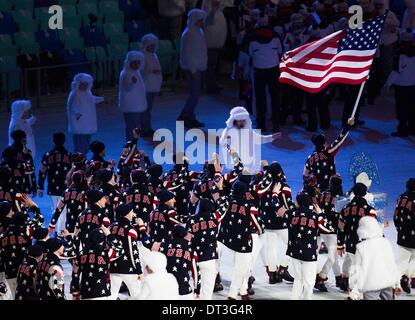 Sochi, Russia. 7th Feb, 2014. 2/8/2014 Sochi, Russia. | The 2014 Sochi Winter Olympics kicked off competition with the Opening Ceremony. Nordic combined skier Todd Lodwick carried the US flag for the Opening Ceremony on Friday in Sochi. Lodwick and the athletes of the USA enter Fisht Stadium during the Opening Ceremony. | Photo Sean M. Haffey UT San Diego. Credit:  U-T San Diego/ZUMAPRESS.com/Alamy Live News Stock Photo