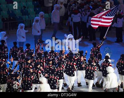 Sochi, Russia. 7th Feb, 2014. 2/782014 Sochi, Russia. | The 2014 Sochi Winter Olympics kicked off competition with the Opening Ceremony. Nordic combined skier Todd Lodwick carried the US flag for the Opening Ceremony on Friday in Sochi. Lodwick and the athletes of the USA enter Fisht Stadium during the Opening Ceremony. | Photo Sean M. Haffey UT San Diego. Credit:  U-T San Diego/ZUMAPRESS.com/Alamy Live News Stock Photo