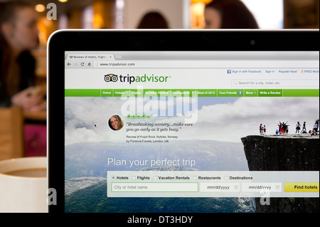 The Trip Advisor website shot in a coffee shop environment (Editorial use only: print, TV, e-book and editorial website). Stock Photo