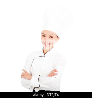 young pretty woman chef standing over white background in studio Stock Photo