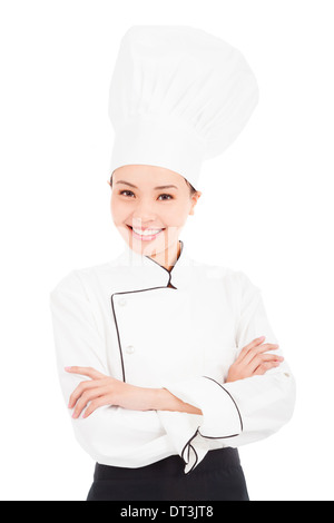 asian young pretty woman chef standing in studio  over white background Stock Photo