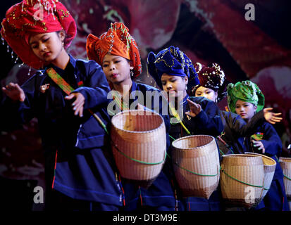 Yangon, Myanmar. 7th February 2014. Pa-Oh ethnic girls perform during ...