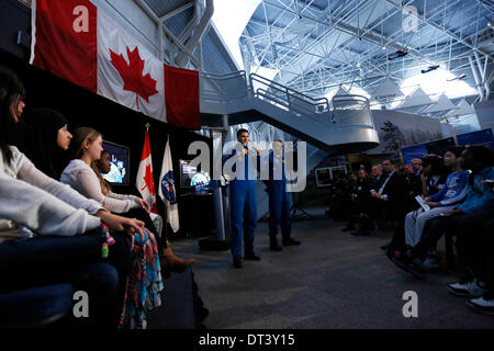 Ottawa, Canada. 7th Feb, 2014. Canadian astronauts Jeremy Hansen (L) and David Saint-Jacques attend a press conference in Ottawa, Canada, Feb. 7, 2014. Canadian Industry Minister James Moore Friday unveiled a new plan to develop the country's space industry, in a bid to safeguard Canada's 'sovereignty, security and prosperity.' The new framework emphasized the role of private sectors and international collaboration to develop space industry. Credit:  David Kawai/Xinhua/Alamy Live News Stock Photo