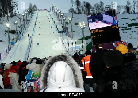 Sochi, Russia. 6th February 2014. Spectators during the Ladies' Moguls Freestyle Skiing Qualification in Rosa Khutor Extreme Park at the Sochi 2014 Olympic Games, Krasnaya Polyana, Russia, 06 February 2014. Photo: Frank May/dpa/Alamy Live News Stock Photo
