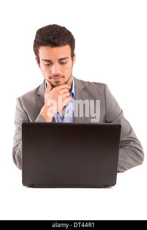 Young handsome man working with laptop computer Stock Photo