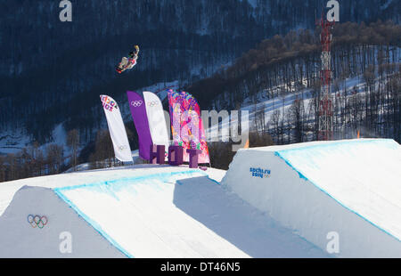 Sochi, Russia. 6th February 2014. 6 Feb 2014, Rosa Khutor, Russia at the Olympic Winter Games Sochi2014. Ladies' snowboard Slopestyle Qualifications in the Rosa Khutor Extreme Park. America's Karly Shorr spins off the first kicker Credit:  Action Plus Sports Images/Alamy Live News Stock Photo