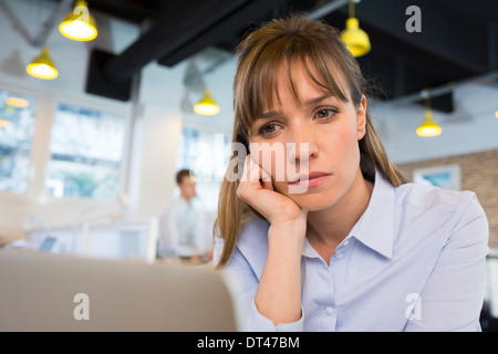 Female business tired desk computer Stock Photo