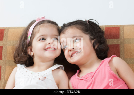 3 years old twin sisters smiling Stock Photo
