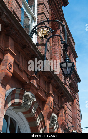 Ornate iron lamp over the entrance door to Lewes Town Hall in East Sussex, England Stock Photo