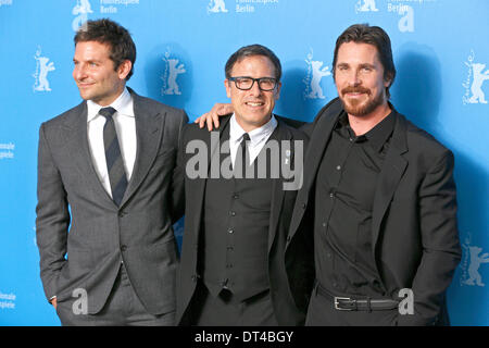 Bradley Cooper, David O. Russell and Christian Bale during the 'American Hustle' photocall at the 64th Berlin International Film Festival / Berlinale 2014 on February 07, 2014 in Berlin, Germany Stock Photo