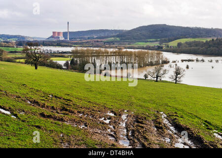 Shropshire, UK. 8th February 2014. Flooded fields near Ironbridge Shropshire,adjacent to the River Severn. Ironbridge Power Station is seen in the background. Credit:  John Bentley/Alamy Live News Stock Photo