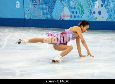 Sochi, Russia. 8th February 2014. Mao Asada of Japan falls during the Figure Skating team event at Iceberg Skating Palace during the Sochi 2014 Olympic Games, Sochi, Russia, 08 February 2014. Photo: Christian Charisius/dpa/Alamy Live News Stock Photo