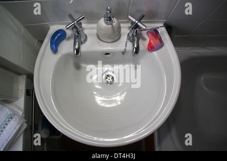 Washhand basin in domestic bathroom Stock Photo