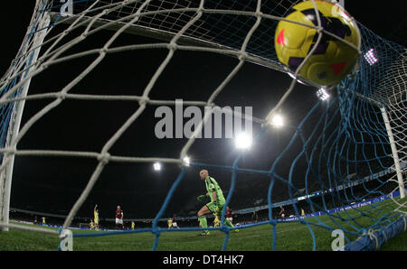 Naples, Italy. 8th Feb, 2014. Napoli's Gokhan Inler scores during the Italian Serie A soccer match against AC Milan at San Paolo stadium in Naples, Italy, Feb. 8, 2014. Napoli won 3:1. Credit:  Alberto Lingria/Xinhua/Alamy Live News Stock Photo