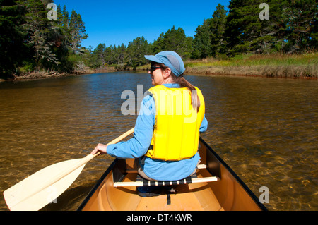 Canoeing on Siltcoos River, Oregon Dunes National Recreation Area, Oregon Stock Photo