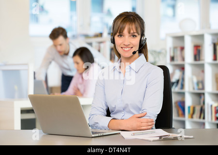 Business woman pretty smiling desk call phone Stock Photo