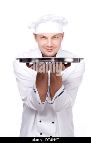 Portrait of professional chef holding empty tray, isolated on white Stock Photo