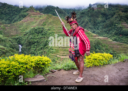 BANAUE -Old ifugao man in national dress next to rice terraces Philippines, Luzon, Asia Stock Photo