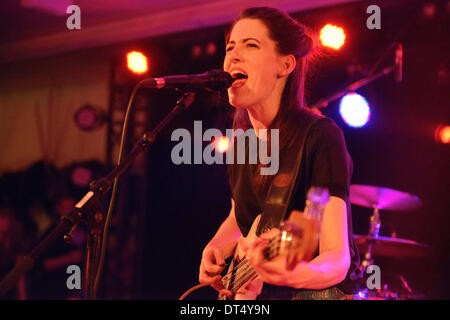 Berlin, Germany. 06th Feb, 2014. Australian Kat Frankie performs with the German pop band Me and My Drummer in HO Berlin project space in Berlin, Germany, 06 February 2014. Photo: Jason Harrell/dpa/Alamy Live News Stock Photo