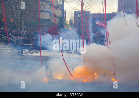 Firecracker ceremony on Chinese New Year 2014 in Chinatown, NYC, 2014 Year Of The Horse. Stock Photo