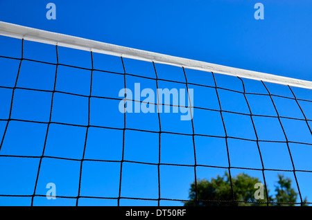 Net for beach volleyball against the blue sky closeup Stock Photo