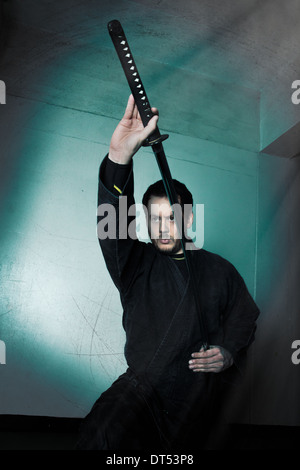 Man practicing martial arts Bujinkan, also known as Ninjitsu, England Stock Photo