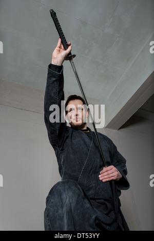 Man practicing martial arts Bujinkan, also known as Ninjitsu, England Stock Photo