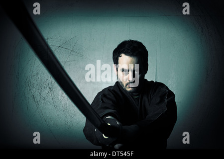 Man practicing martial arts Bujinkan, also known as Ninjitsu, England Stock Photo