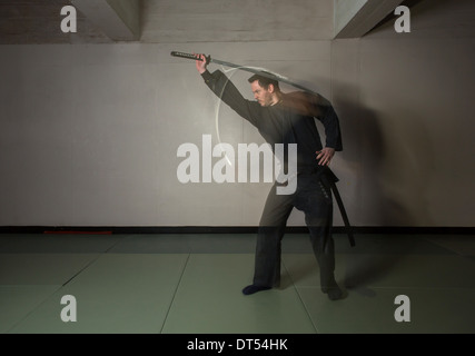 Man practicing martial arts Bujinkan, also known as Ninjitsu, England Stock Photo