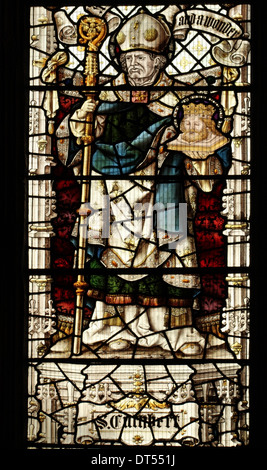 Stained Glass Window depicting Saint Cuthbert holding St Oswald's Head, , by Percy Bacon & Brothers, St Mary Magdalene Church, Newark on Trent Church Stock Photo