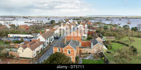 East Lyng, Somerset, UK. 9th Feb, 2014. Heavy flooding in the village of East Lyng on the Somerset Levels taken 9th February 2014. This panorama taken from the top of St. Bartholomew's church shows the village nearly surrounded by water. The A361 remains closed towards Burrowbridge and a severe flood alert remains in the area where there is a danger to life. Water is rising rapidly in the East of the village and has started to flood some houses. Some residents have been asked to evacuate but have decided to stay. This is the worst flood on the Somerset Levels in living history. Stock Photo