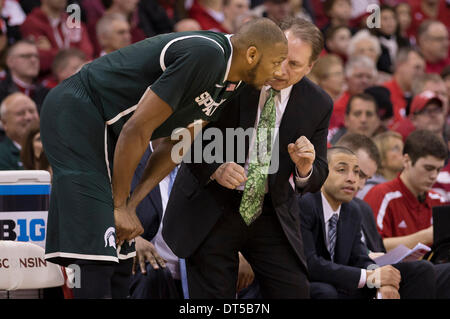 Madison, Wisconsin, USA. 9th Feb, 2014. February 9, 2014: Michigan State coach Tom Izzo talks with Michigan State Spartans forward Adreian Payne #5 during the NCAA Basketball game between the Michigan State Spartans and the Wisconsin Badgers at the Kohl Center in Madison, WI. Wisconsin defeated Michigan State 60-58. John Fisher/CSM/Alamy Live News Stock Photo