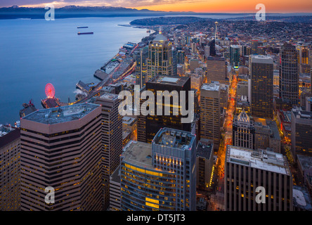 Seattle downtown with Elliot Bay and distant Olympic mountain range seen from above Stock Photo