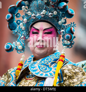Proud Chinese man wearing makeup parades at the Lunar New Year Festival in Chinatown. Stock Photo