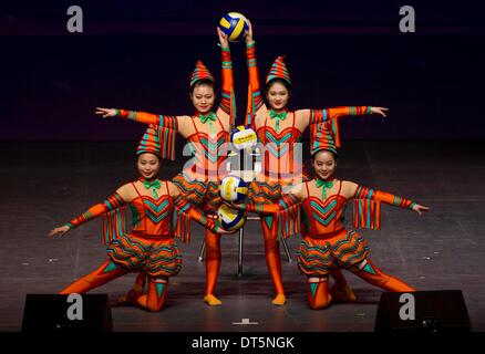 Toronto, Canada. 9th Feb, 2014. Chinese acrobats perform 'Kicking Balls' during the Chinese New Year Carnival 2014 at Sony Centre for the Performing Arts in Toronto, Canada, Feb. 9, 2014. Staged by Broadcast National Orchestra of China, this year's Chinese New Year Carnival, a seven-city, eight-show Canada tour, started here to celebrate the Spring Festival and show Canadians the appealing power of Chinese culture on Sunday. © Zou Zheng/Xinhua/Alamy Live News Stock Photo