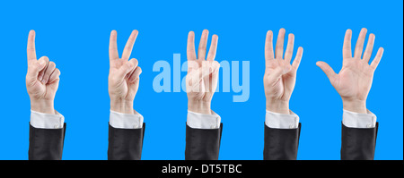 Businessman counting hands. Stock Photo