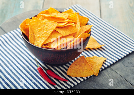 Corn nachos in bowl on wooden backgrpond Stock Photo