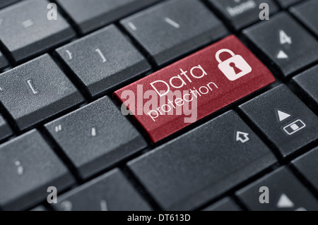 Security Concept. Words Data protection on button of computer keyboard. Stock Photo