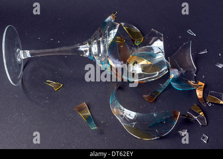 Broken wine glass on black background Stock Photo