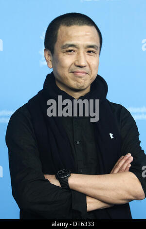 Berlin, Germany. 10th Feb, 2014. Director Lou Ye poses for photos during a photocall to promote the movie 'Blind Massage' at the 64th Berlinale International Film Festival in Berlin, Germany, on Feb. 10, 2014. 'Blind Massage' is one of the three Chinese films vying for prizes in the Competition program. Credit:  Zhang Fan/Xinhua/Alamy Live News Stock Photo