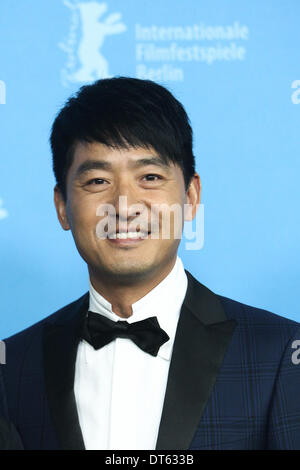 Berlin, Germany. 10th Feb, 2014. Actor Guo Xiaodong poses for photos during a photocall to promote the movie 'Blind Massage' at the 64th Berlinale International Film Festival in Berlin, Germany, on Feb. 10, 2014. 'Blind Massage' is one of the three Chinese films vying for prizes in the Competition program. Credit:  Zhang Fan/Xinhua/Alamy Live News Stock Photo