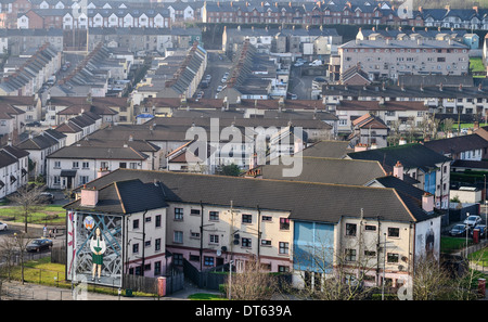 Ireland, Derry, View of the Bogside housing area with  mural seen from the city walls. Stock Photo