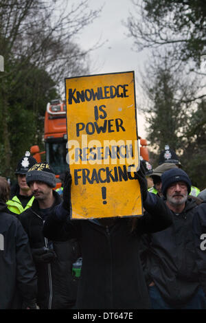 Barton Moss, Manchester, UK. 10th Feb, 2014.  Protests by anti-fracking campaigners and a policing operation by Greater Manchester Police continue at IGAS Drilling Site at Barton Moss. Protestors are seeking to delay and obstruct delivery vehicles and drilling equipment en-route to the controversial gas exploration site. Fracking protestors have set up a camp at Barton Moss Road, Eccles a potential methane-gas extraction site in Salford, Greater Manchester. Credit:  Mar Photographics/Alamy Live News. Stock Photo