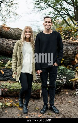 Portrait of young happy couple in woods