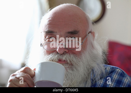 Senior man drinking tea Stock Photo