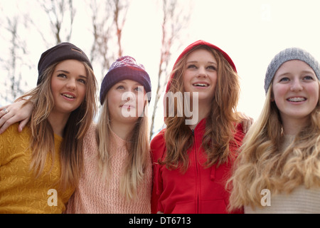 Portrait of four teenage girls in hats Stock Photo