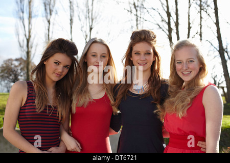 Portrait of four teenage girls dressed for party Stock Photo