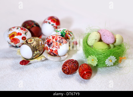Painted Colorful Easter Eggs on linen fabric Stock Photo