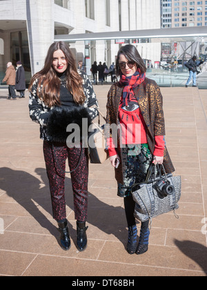 Fashionistas in their finery outside of the Fall 2014 Fashion Week shows in Lincoln Center in New York Stock Photo